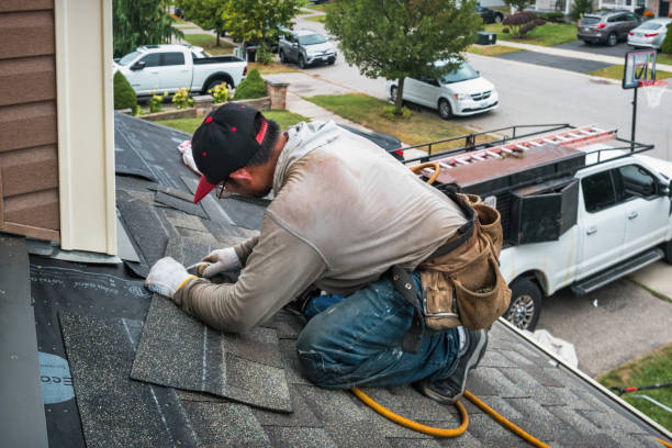 Professional Storm Damage Roof Repair technician working in Santa Ana, CA
